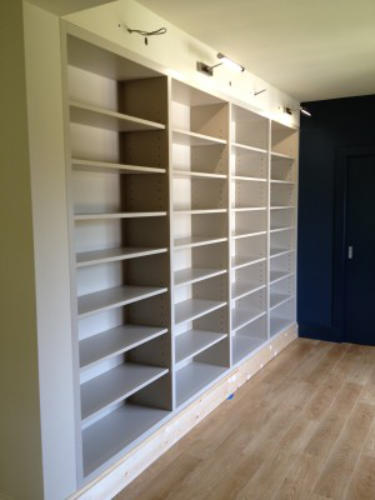 Fitted bookcase with lighting