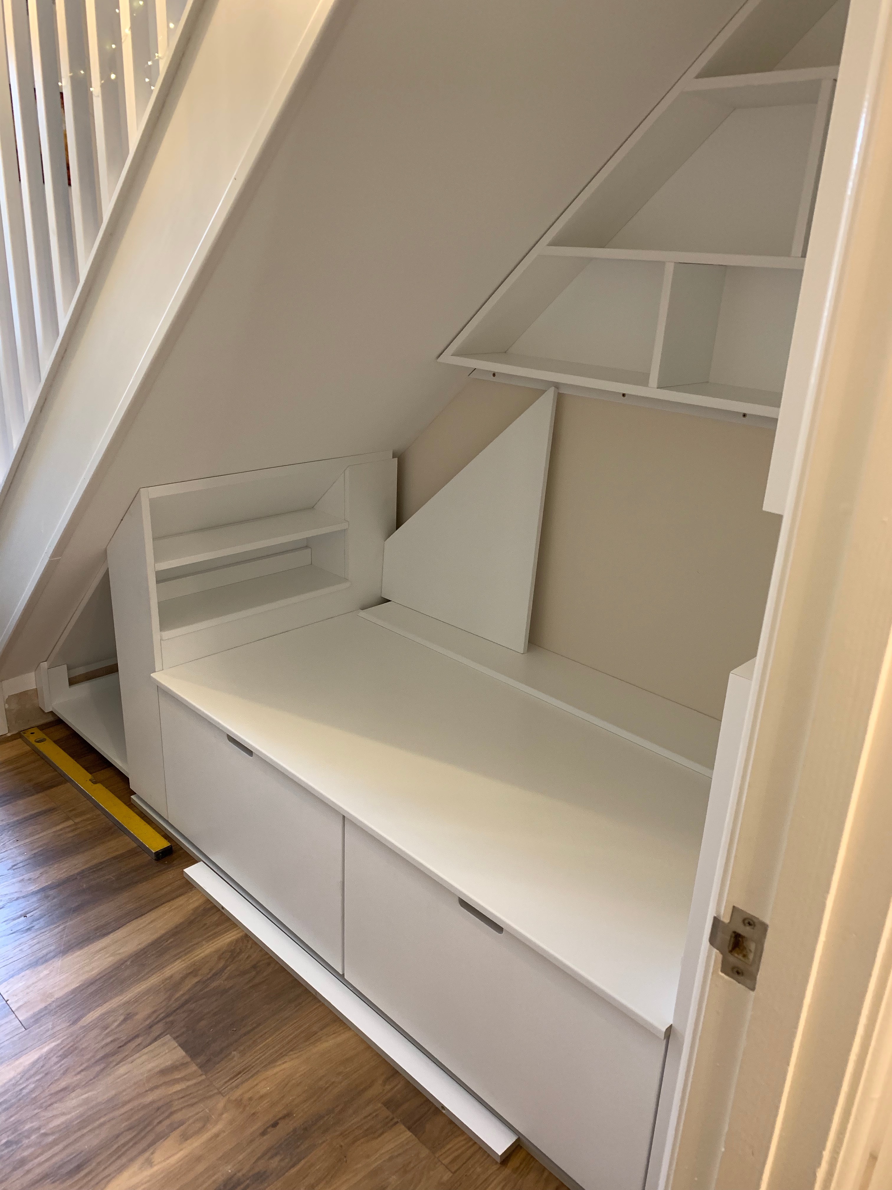 Under stairs seating and storage